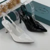 Prada White and Black Shiny Saffiano Leather Bow Accent Slingback